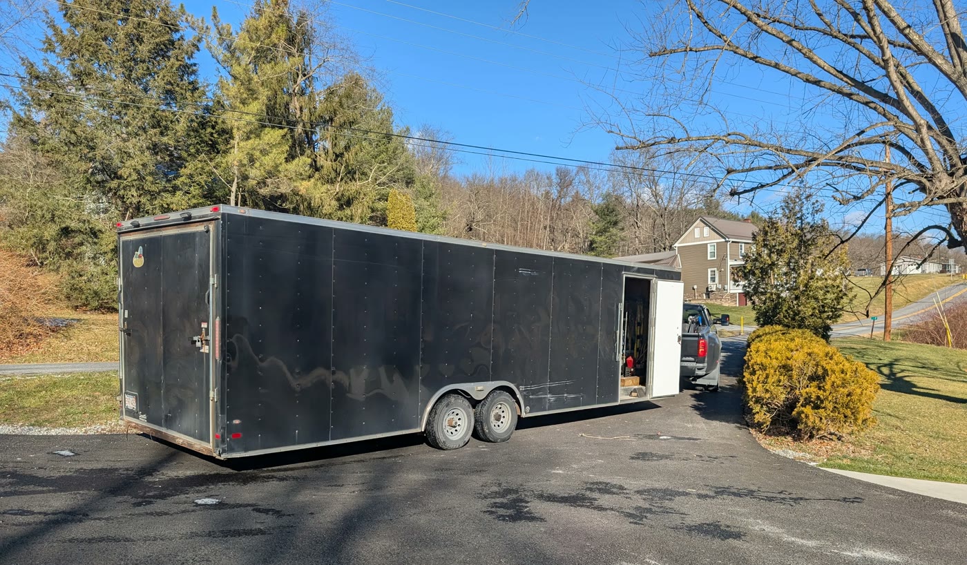 Our enclosed trailer parked at the buyer's driveway